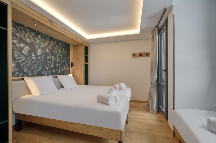 2 lits simples (90*200) + 1 lit simple (80*190) avec TV