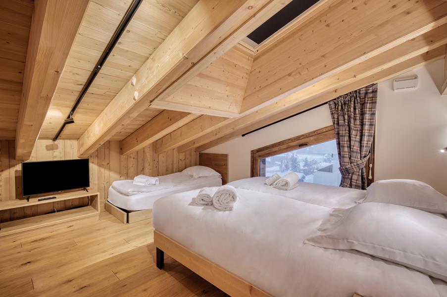 2 lits simples (90*200) + 1 lit simple (80*190) avec TV