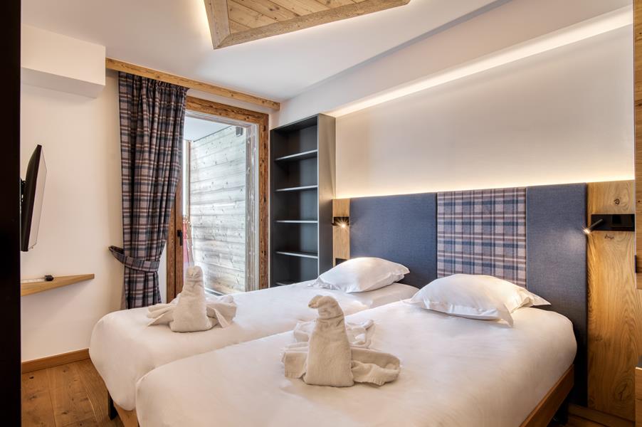 2 lits simples (90*200) avec TV