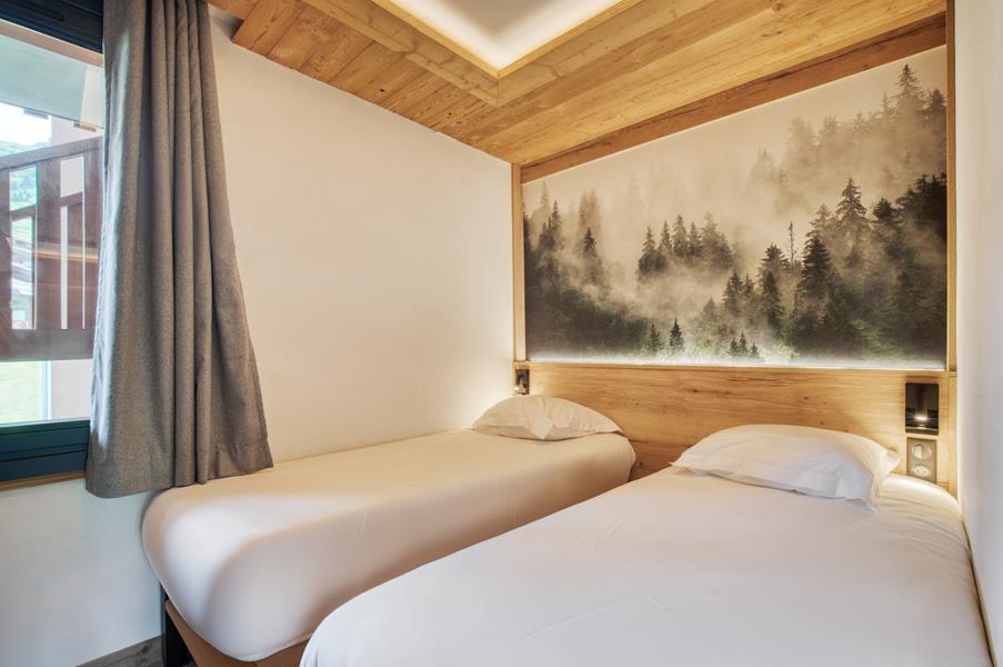 2 lits simples (80*200) avec TV