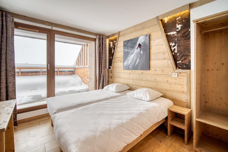 2 lits simples (90*200) et salle de bain attenante