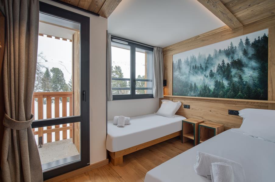 2 lits simples (90*200) avec TV