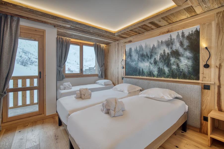 2 lits simples (90*200) + 1 lit simple (80*190) avec TV