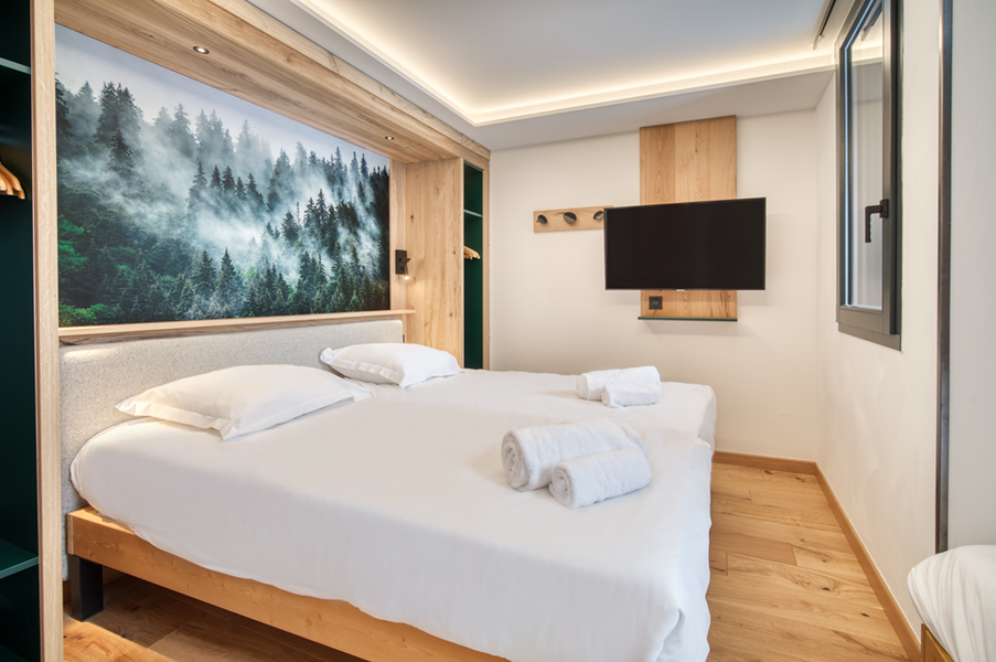 2 lits simples (90*200) + 1 lit simple (80*190) avec TV